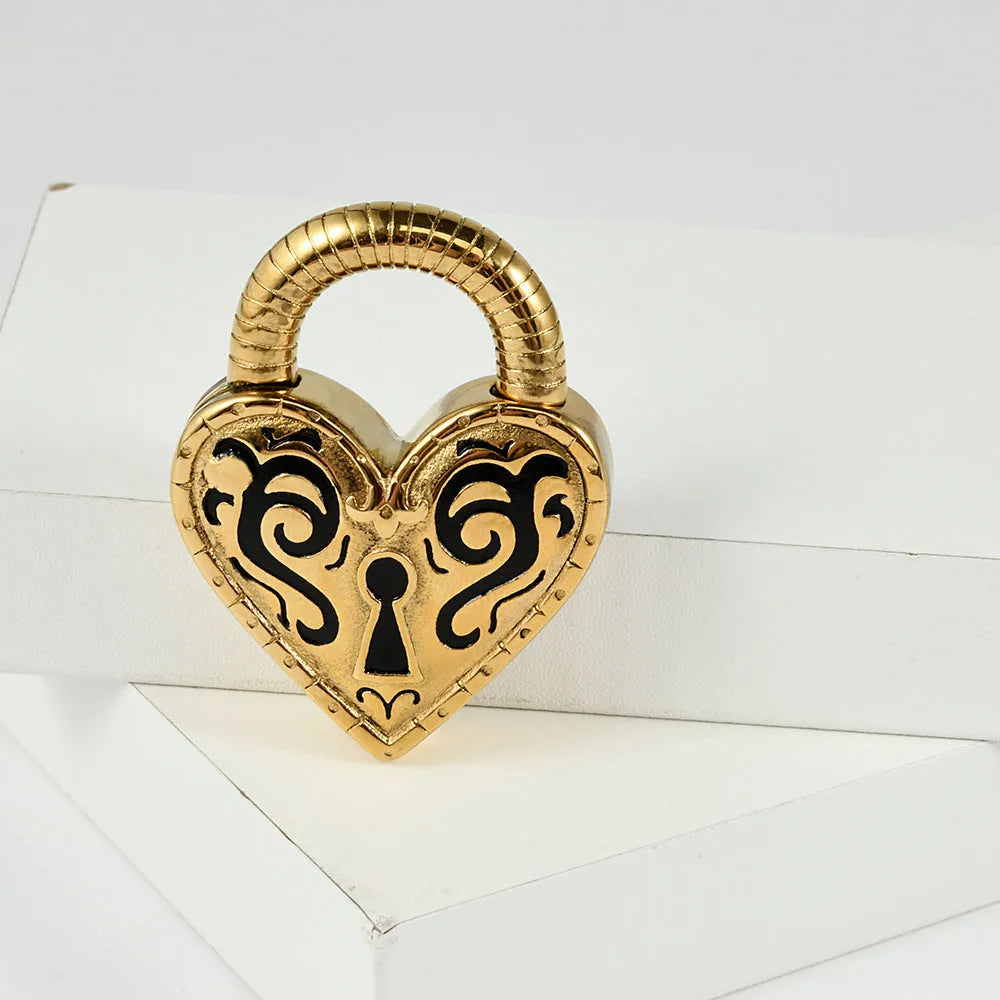 A single heart-shaped earring in stainless steel with a choice of gold or steel electroplated colour.
