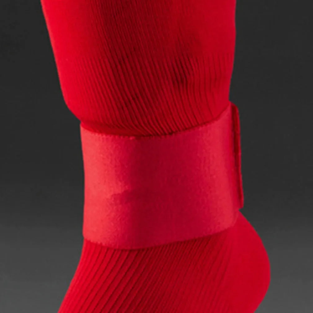 Rubber shin guard magic tape belt in four colours for football and cycling sports