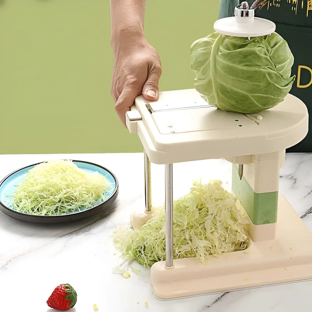 Beige stainless steel vegetable slicer chopper grater with spiralizer function on kitchen counter