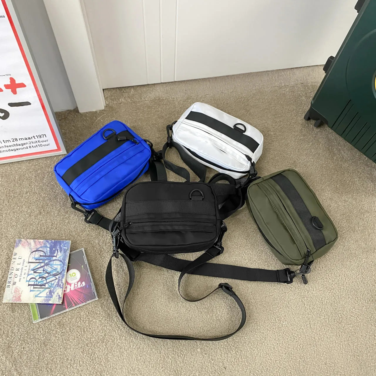 Men's nylon crossbody messenger bag in black, blue, green, or white with 22cm length