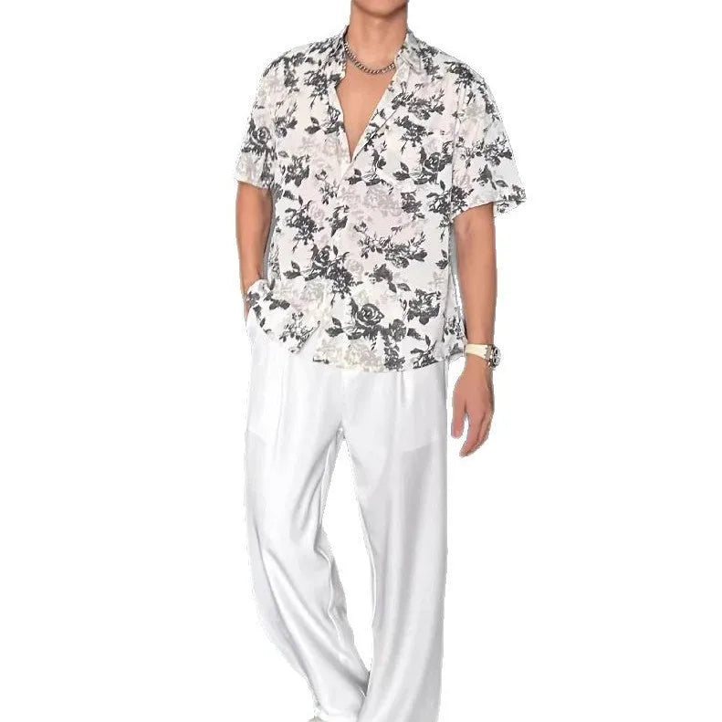 Loose casual short sleeve shirt with a floral print in a cardigan style.