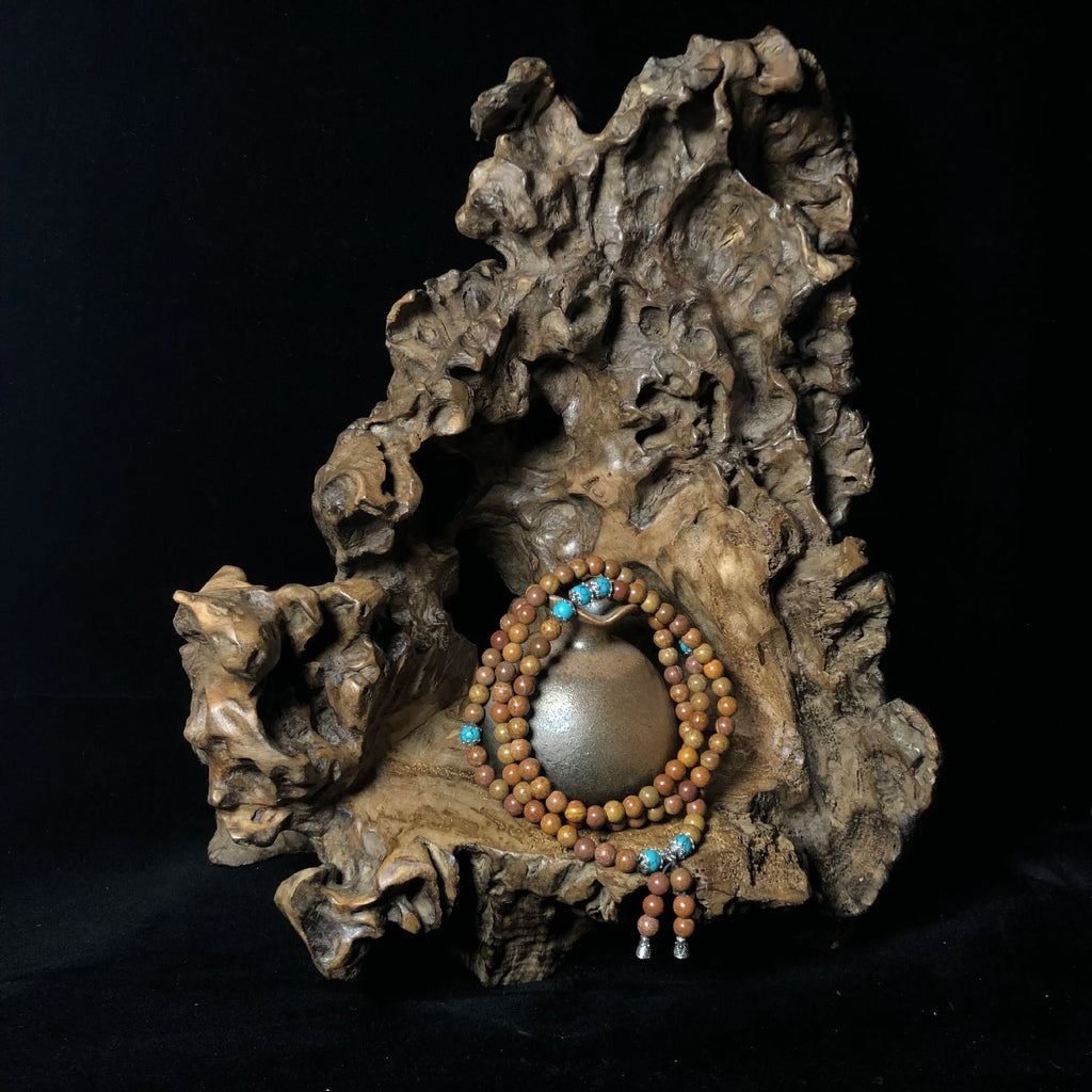 Handmade geometric stone bead bracelet with 108 Lvzhu beads measuring 5-6mm diameter