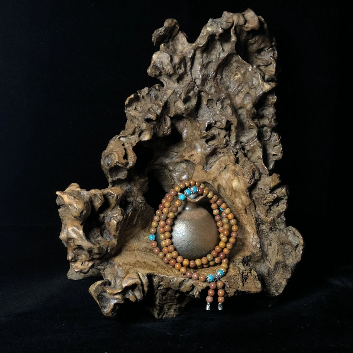 Handmade geometric stone bead bracelet with 108 Lvzhu beads measuring 5-6mm diameter
