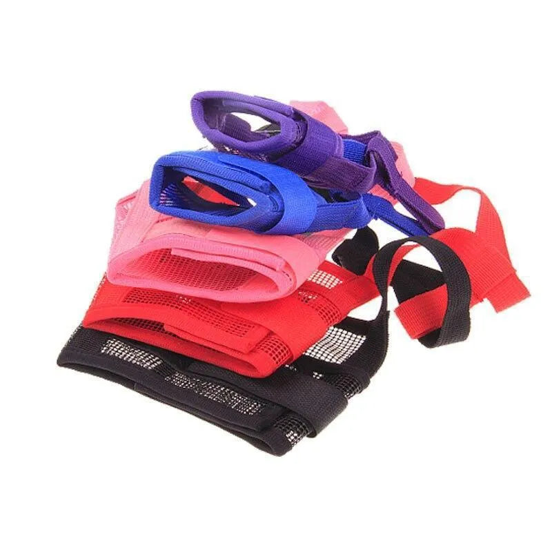 Adjustable plastic dog muzzle shown in multiple colours on a size chart from S to XXL.