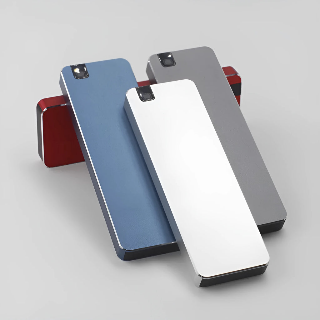 White mobile solid state hard disk with metal shell and USB cable showing compact 0.6cm × 3.2cm × 1cm dimensions