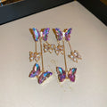 Silver needle crystal flowers butterfly tassel earrings with blue purple electroplated alloy design