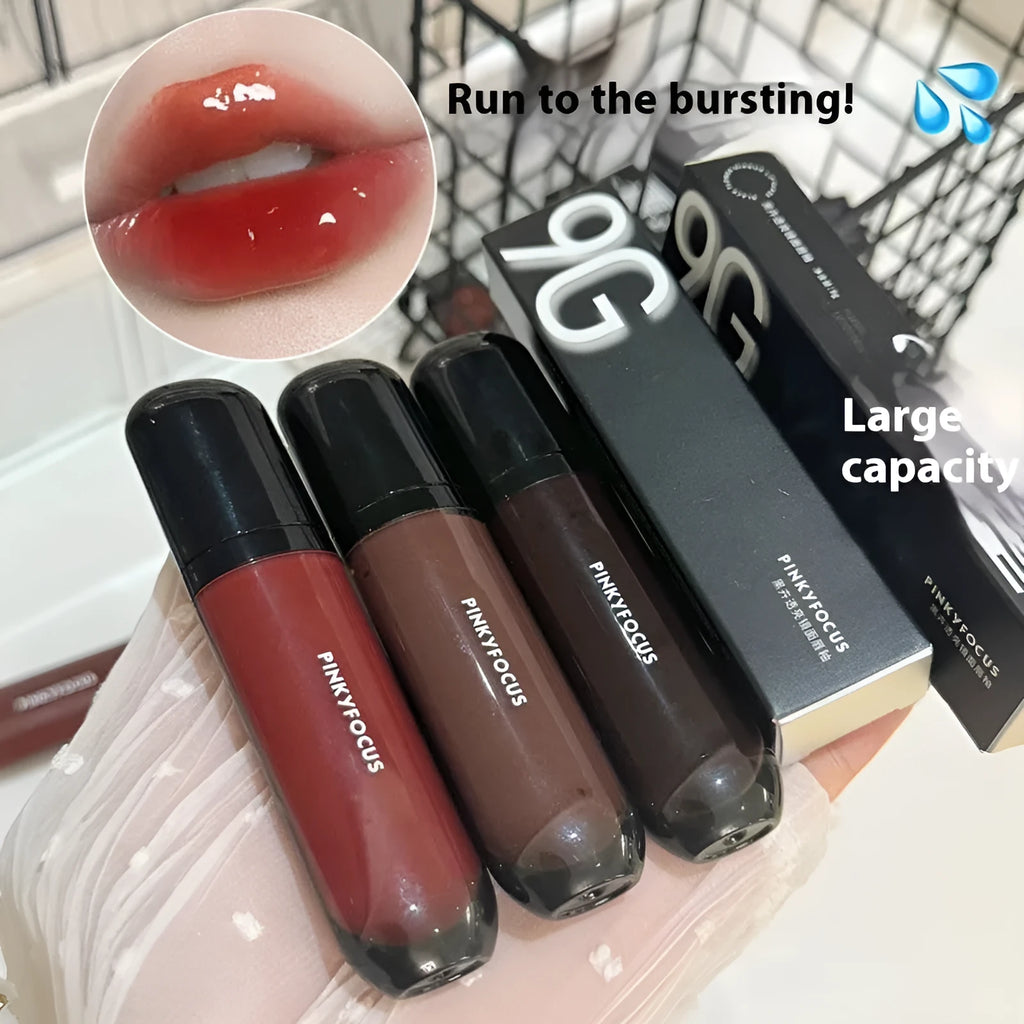 Black Shiny Makeup Mirror Lip Lacquer in six colour options including tomato, orange brown, and rose.