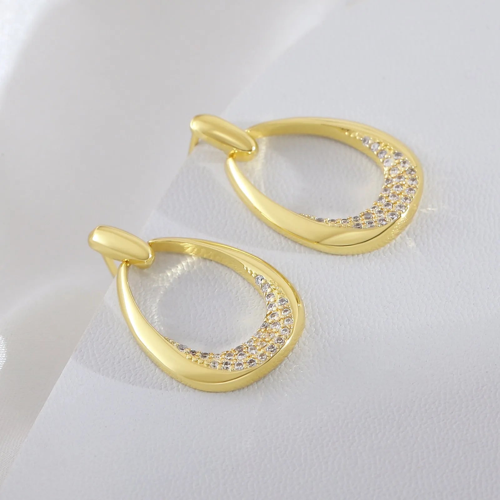 Women's yellow gold geometric drop earrings with zircon detailing, measuring 2.6cm by 1.7cm