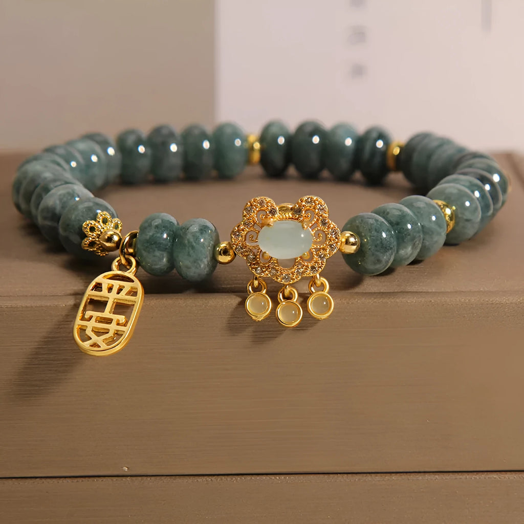 Women's bracelet with natural emerald jade abacus beads and alloy safety lock closure