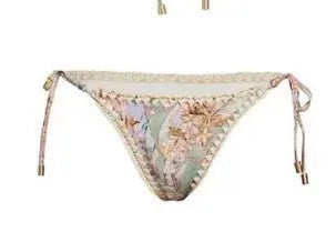 Women's creamy-white floral bikini set with matching skirt in nylon fabric