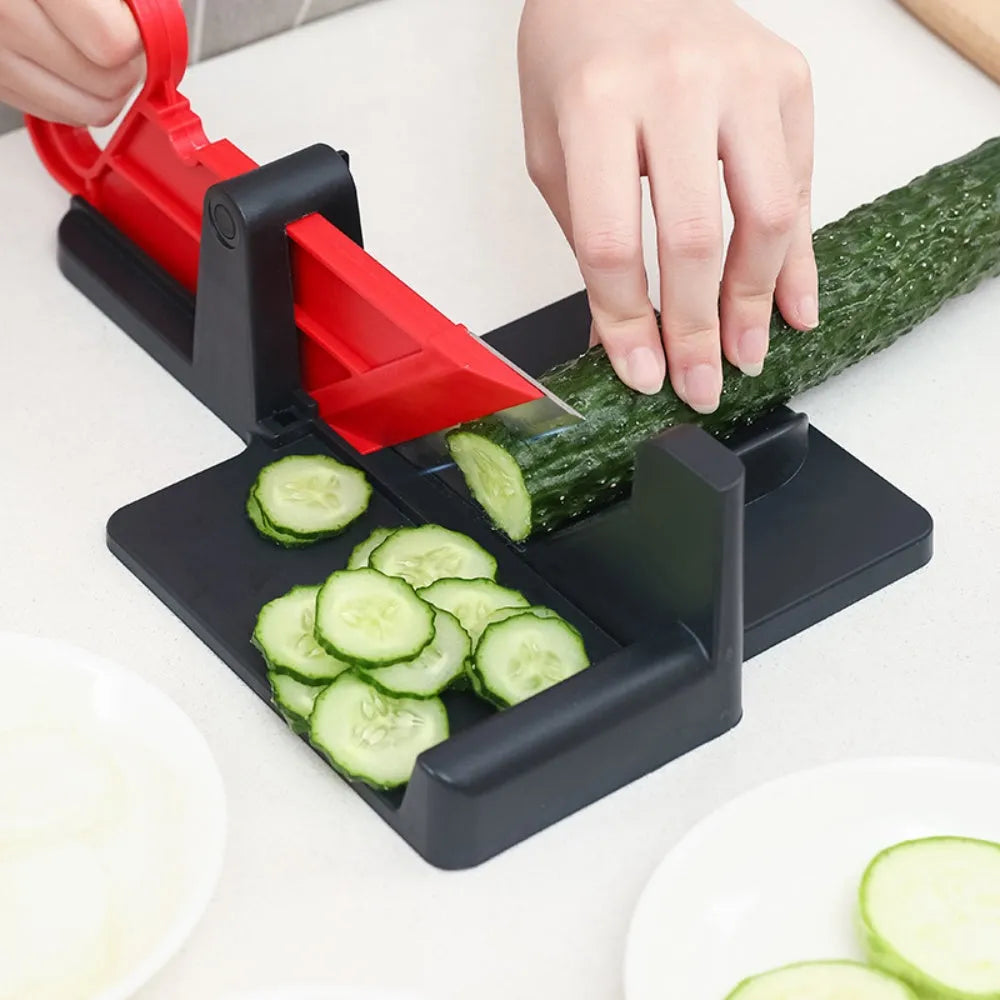 Green manual vegetable cutter with stainless steel blades for chopping carrots and potatoes