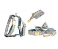 Blue floral pattern dog collar set with adjustable sizing and multiple accessory pieces
