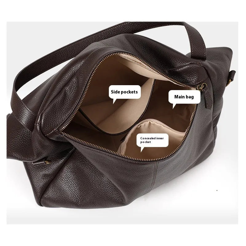 Brown genuine leather women's commuter shoulder bag with horizontal square shape showing zipper compartment