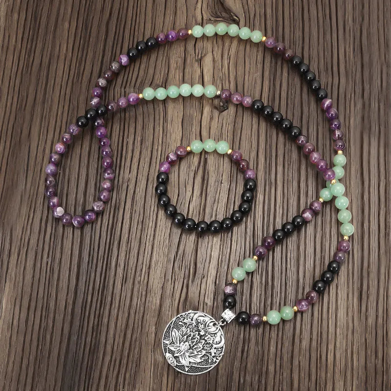 Handmade stone bead yoga necklace with geometric alloy lotus pendant and matching bracelet.