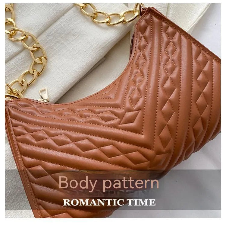 Brown PU pleated chain baguette shoulder bag showing vertical square shape with sewing line detailing