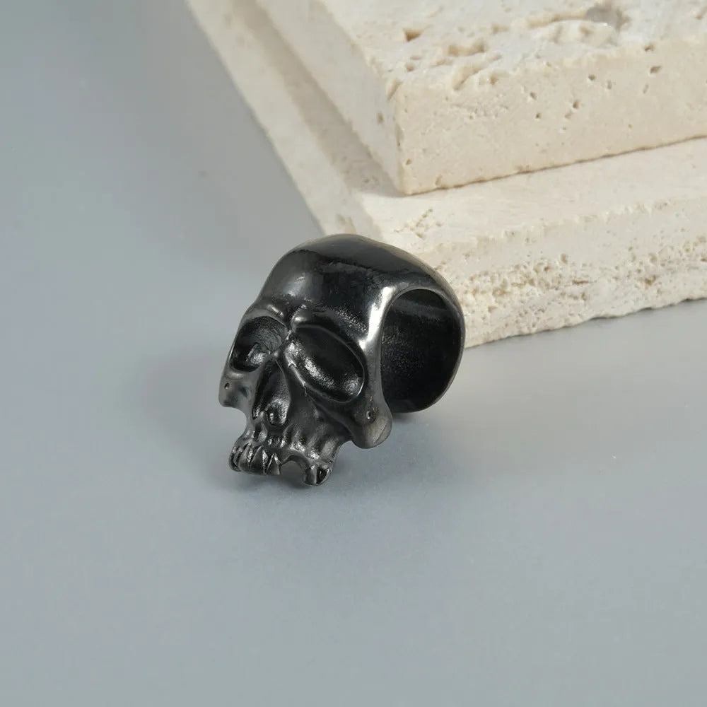Stainless steel hollow skull Buddha earrings in four electroplated colour options