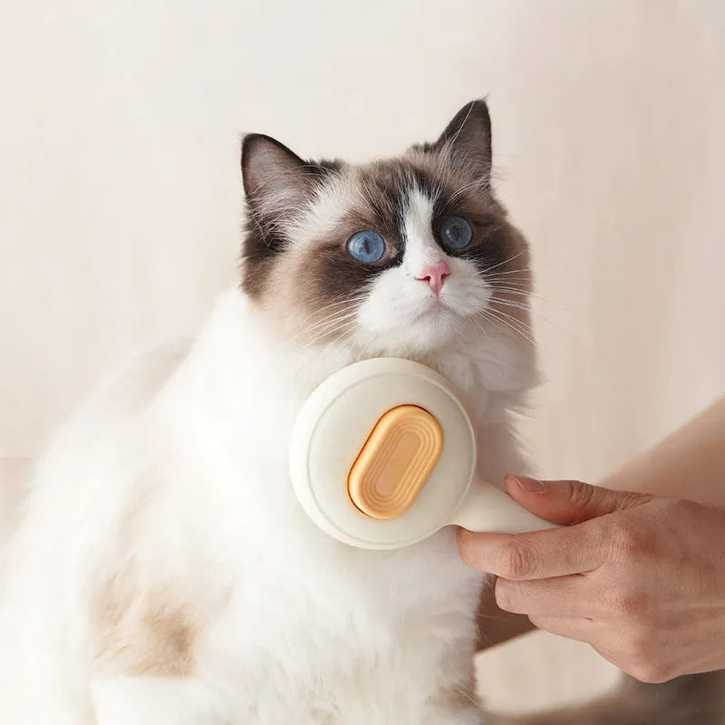 Stainless steel cat grooming brush with non-slip handle in green or yellow colour