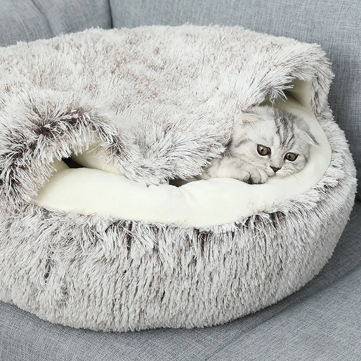 Round plush hooded cat bed in faux fur with non-skid base, semi-enclosed donut shape, available in 40cm, 50cm, 60cm
