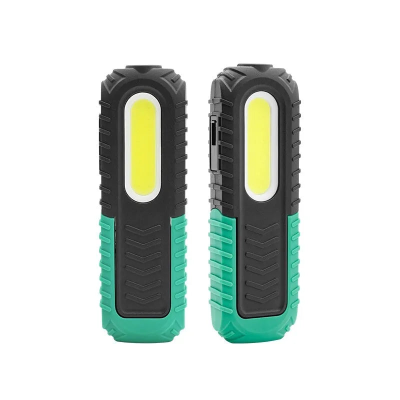 Black and green auto repair work light with USB charging port and drop-resistant coating