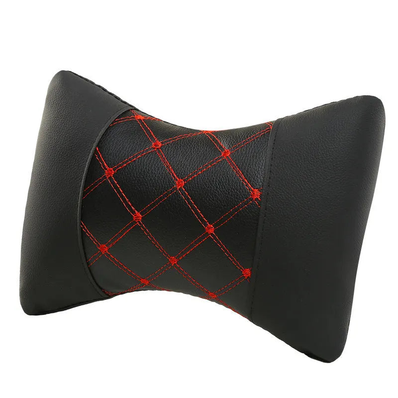 Black diamond quilted car headrest pillow with contrast stitching for neck and cervical support.
