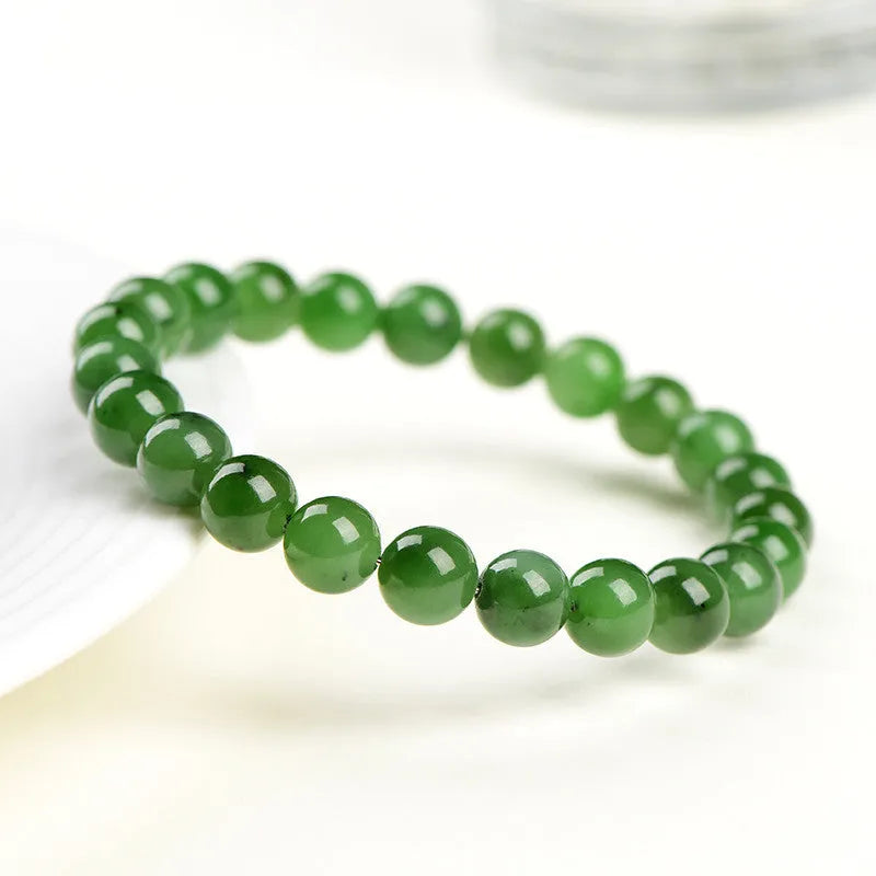 Natural Hetian jade Jasper ball bracelet showing polished beads in one of five available size ranges