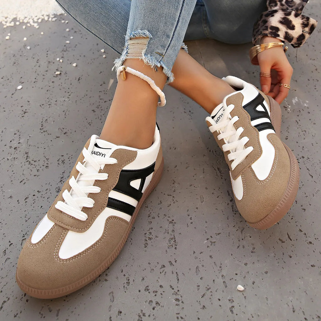 Women's retro colour matching lace-up jogging shoes in grey with low platform heel and round toe.