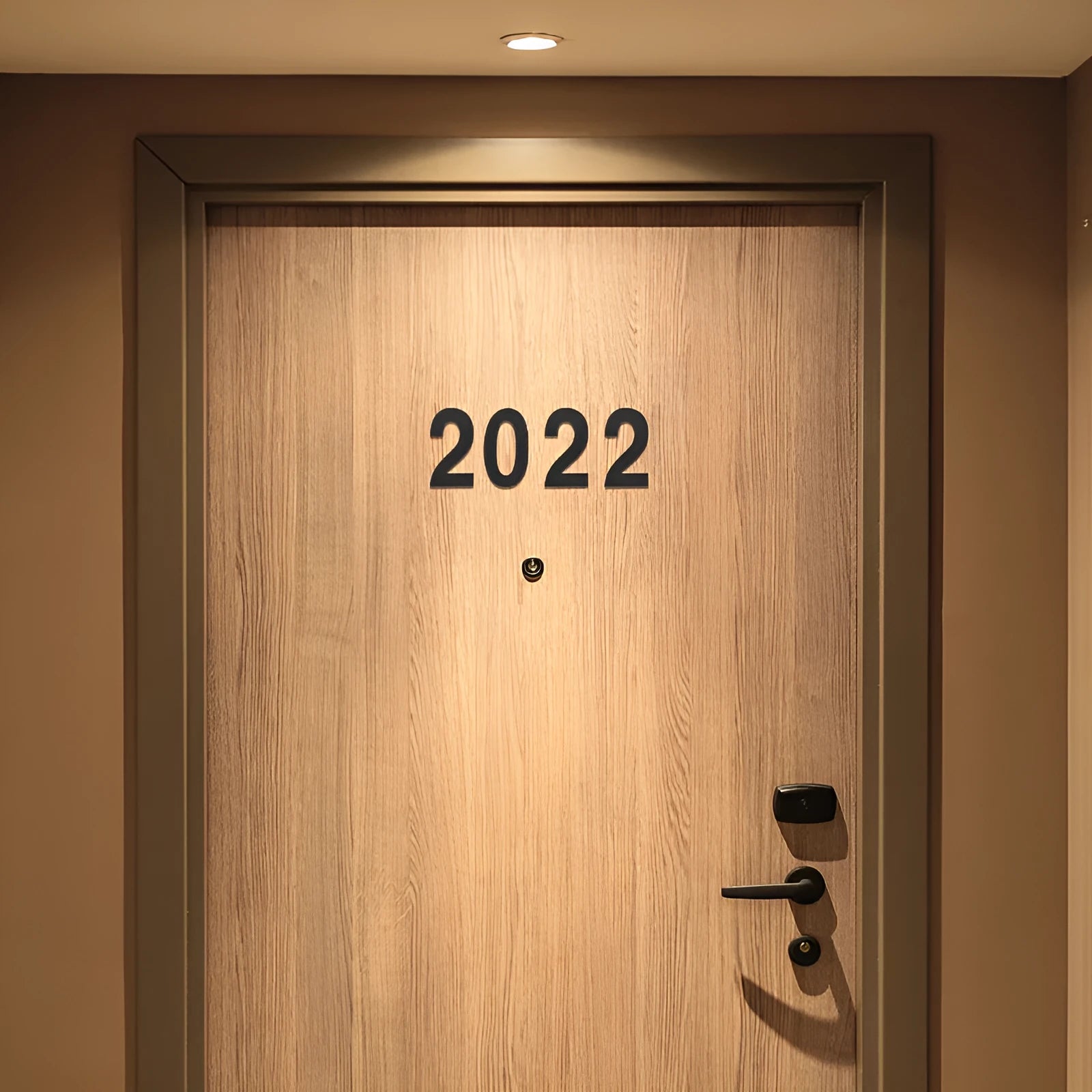 Black stainless steel adhesive house number sign showing the number 7, measuring 7.5cm.