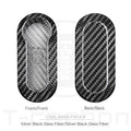 Carbon fibre and glass fibre replacement shell for a car key fob in black, red, and silver black finishes.