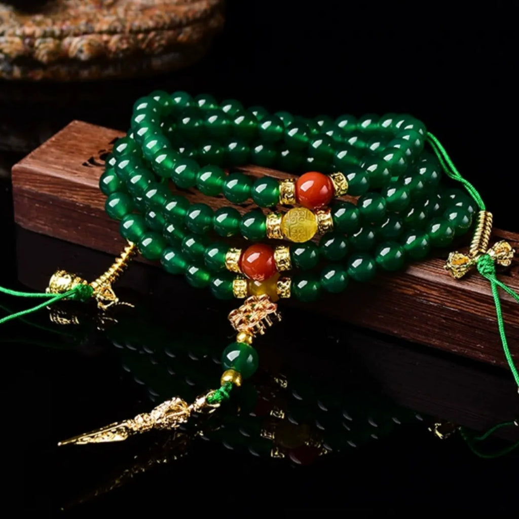 Natural green agate multi-circle bracelet for men and women on a wrist, showing bead detail.
