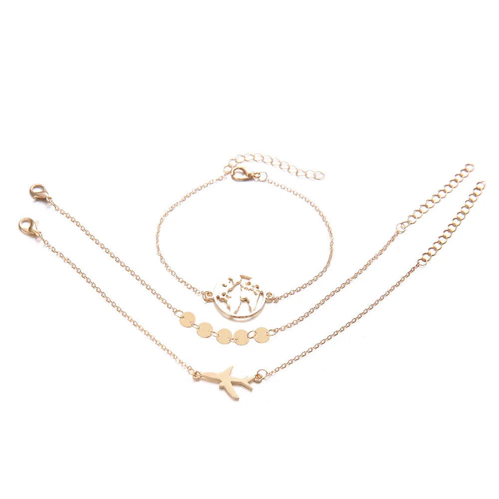 Three bohemian bracelets with heart-shaped aircraft map charms in alloy with electroplated finish