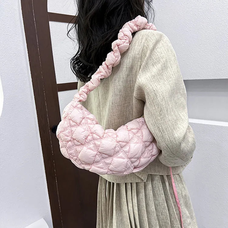 Women's light beige nylon messenger bag with long shoulder strap, shown with dimensions 35cm wide by 20cm high.
