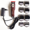 Charging hair clipper with stainless steel cutter head on a white background.