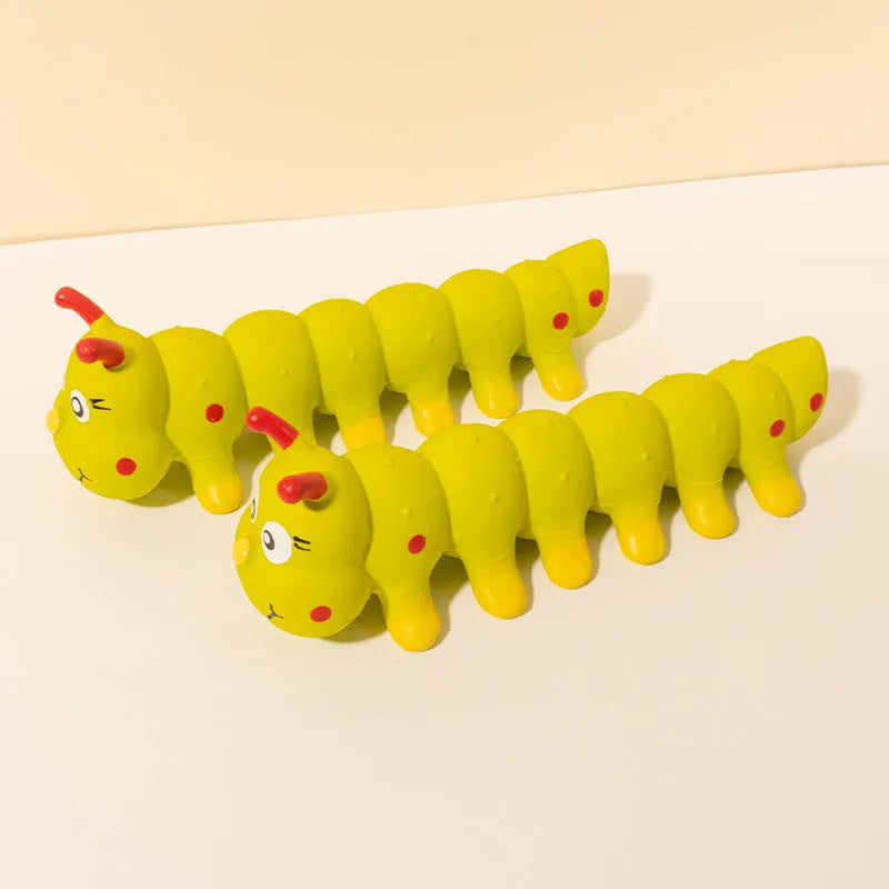 Yellow caterpillar-shaped rubber dog toy with squeaker for small and medium dogs