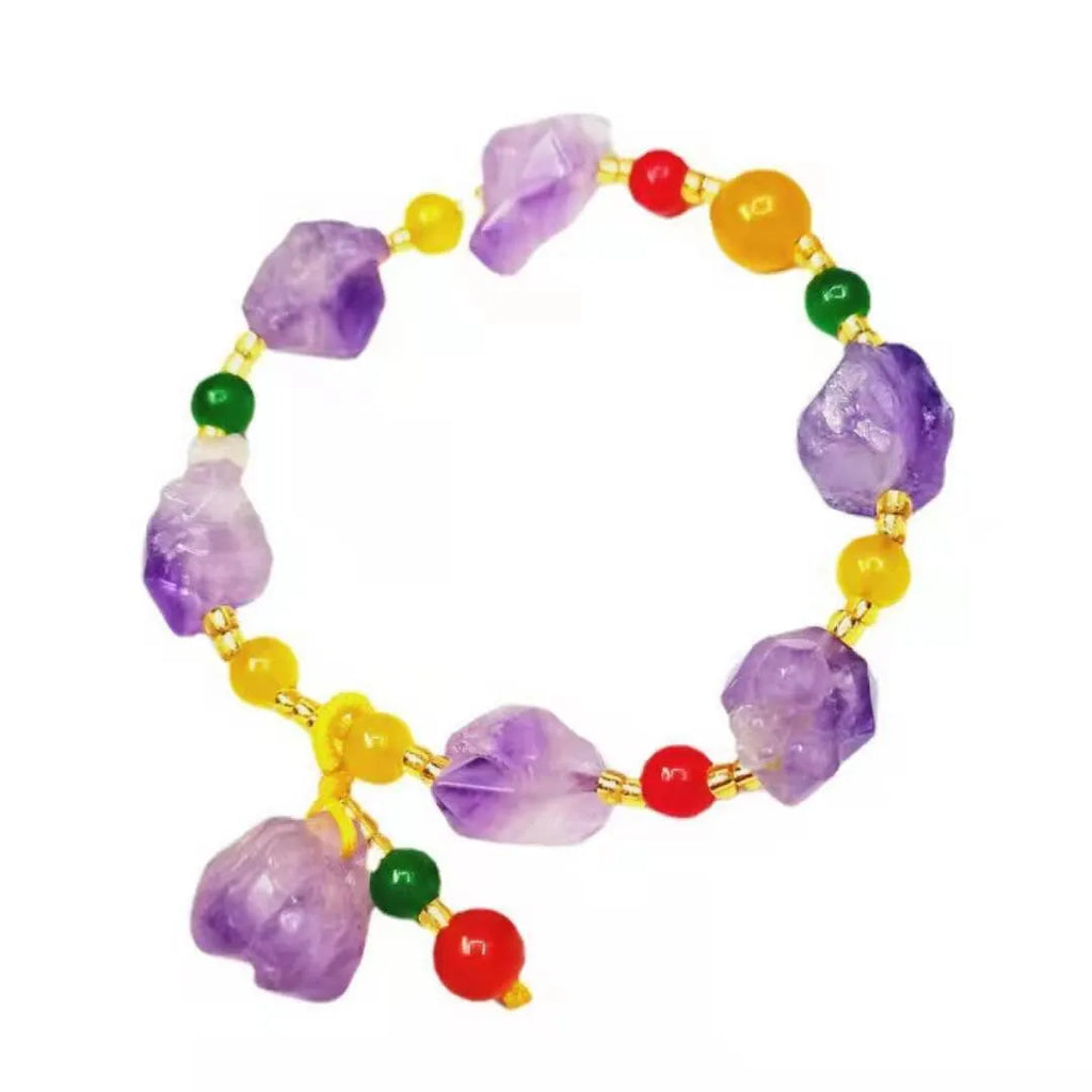 A natural style women's bracelet made with amethyst-shaped beads and a decorative fu character.