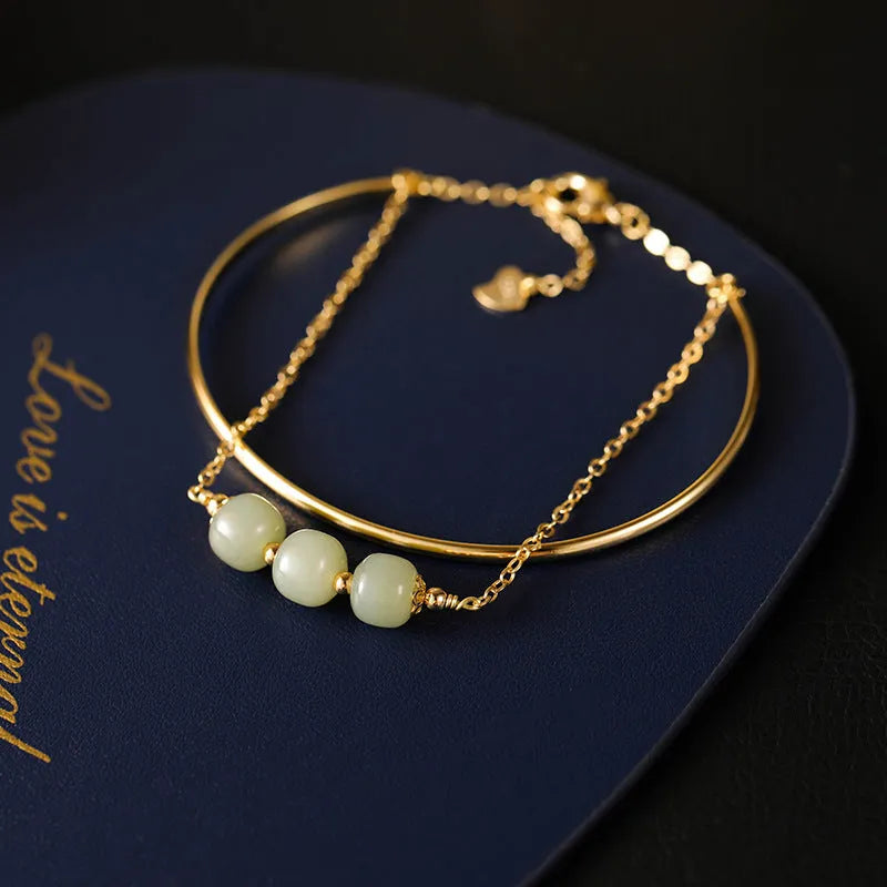 Women's jade lucky beads bracelet with gold inlay in single, double, or three beads options