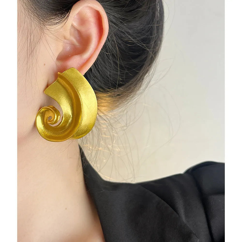 Retro geometric alloy ear studs measuring 5cm in gold and silver electroplated finishes.