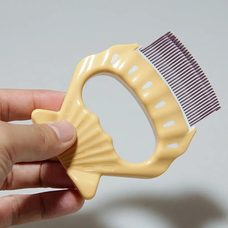 Shell-shaped pet grooming brush with bent wire bristles in green, orange or purple colours