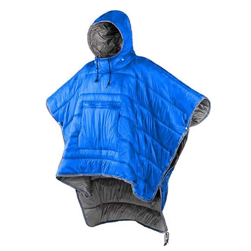 Adult wearing a gray hooded outdoor cloak that converts into a sleeping bag, shown laid flat at 200cm x 140cm.