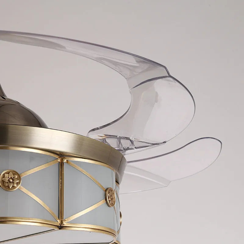 Gold 42-inch ceiling fan light with invisible blades and remote control on a white ceiling.