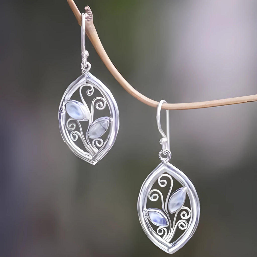 Silver leaf-shaped women's earrings with embedded colourful moonstones on alloy backing
