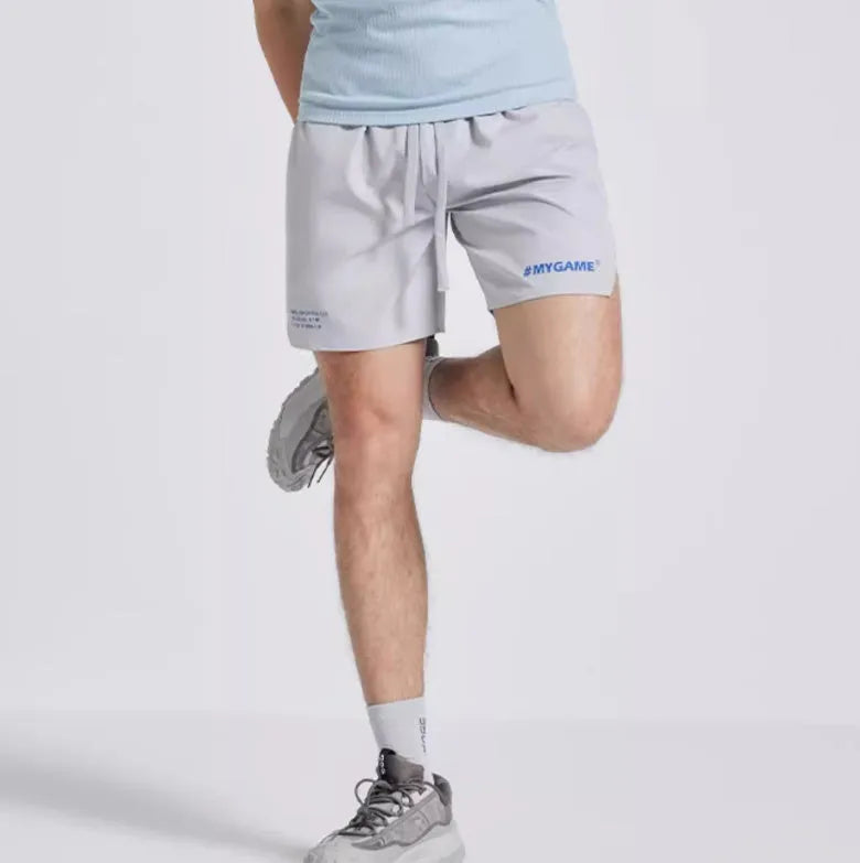 Men's fitness training shorts in blue, black, grey, or white made from polyester and spandex fabric.
