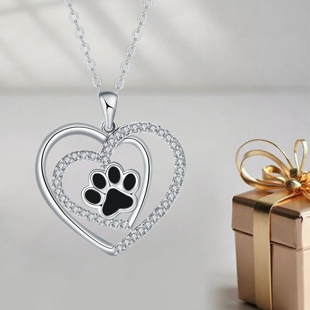 Gold colour dog paw print and heart necklace on cross chain for women