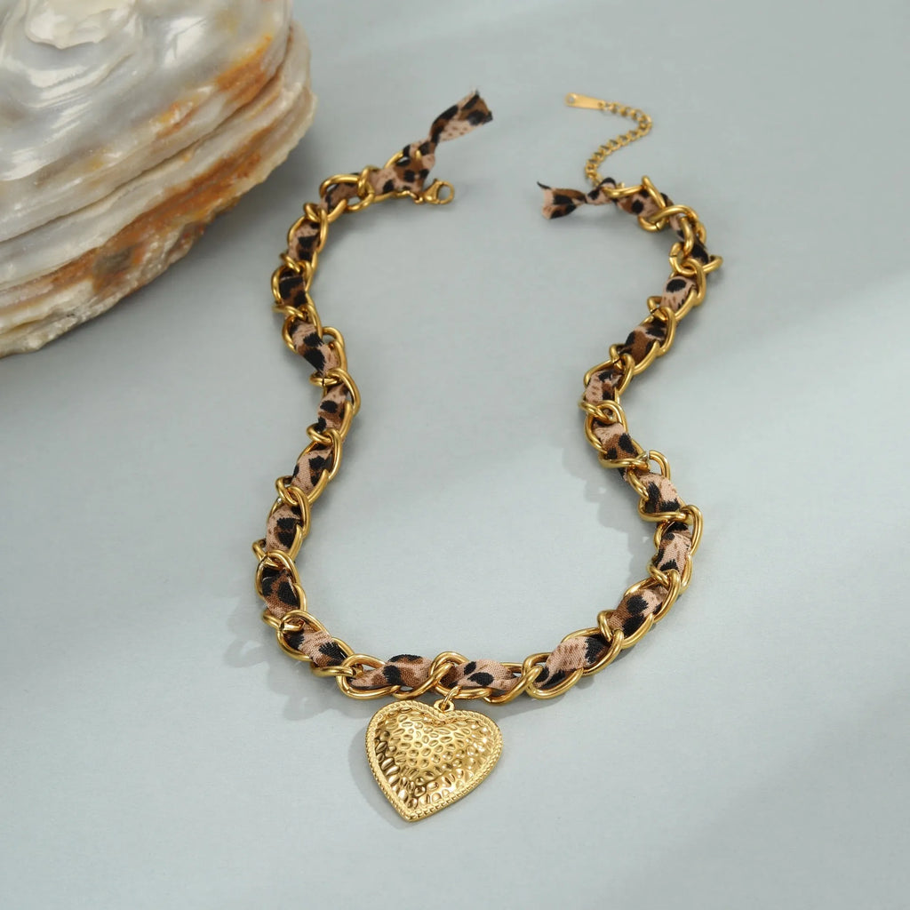 Stainless steel leopard love pendant necklace with geometric design and 18K gold electroplating on adjustable chain