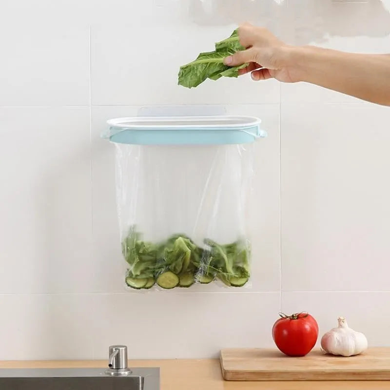 Blue plastic kitchen garbage bag storage rack holding a roll of bin liners.