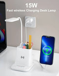 Black wireless charging desk lamp with pen holder and storage compartments
