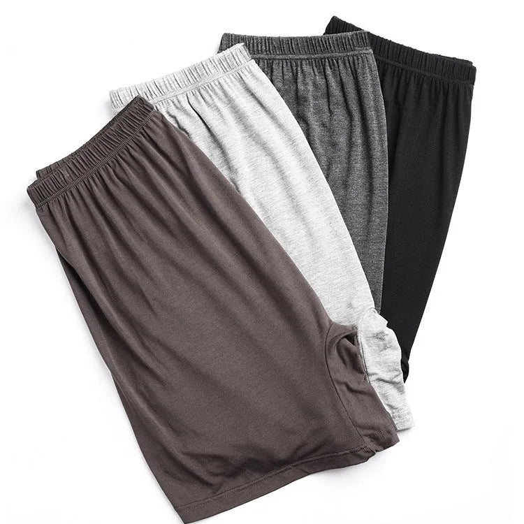 Men's solid colour modal boxer shorts on a white background, showing high-waist design.
