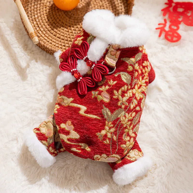 Lunar New Year brocade pet jumpsuit with faux fur trim, Chinese knot buttons and floral-gold motifs in red or beige.