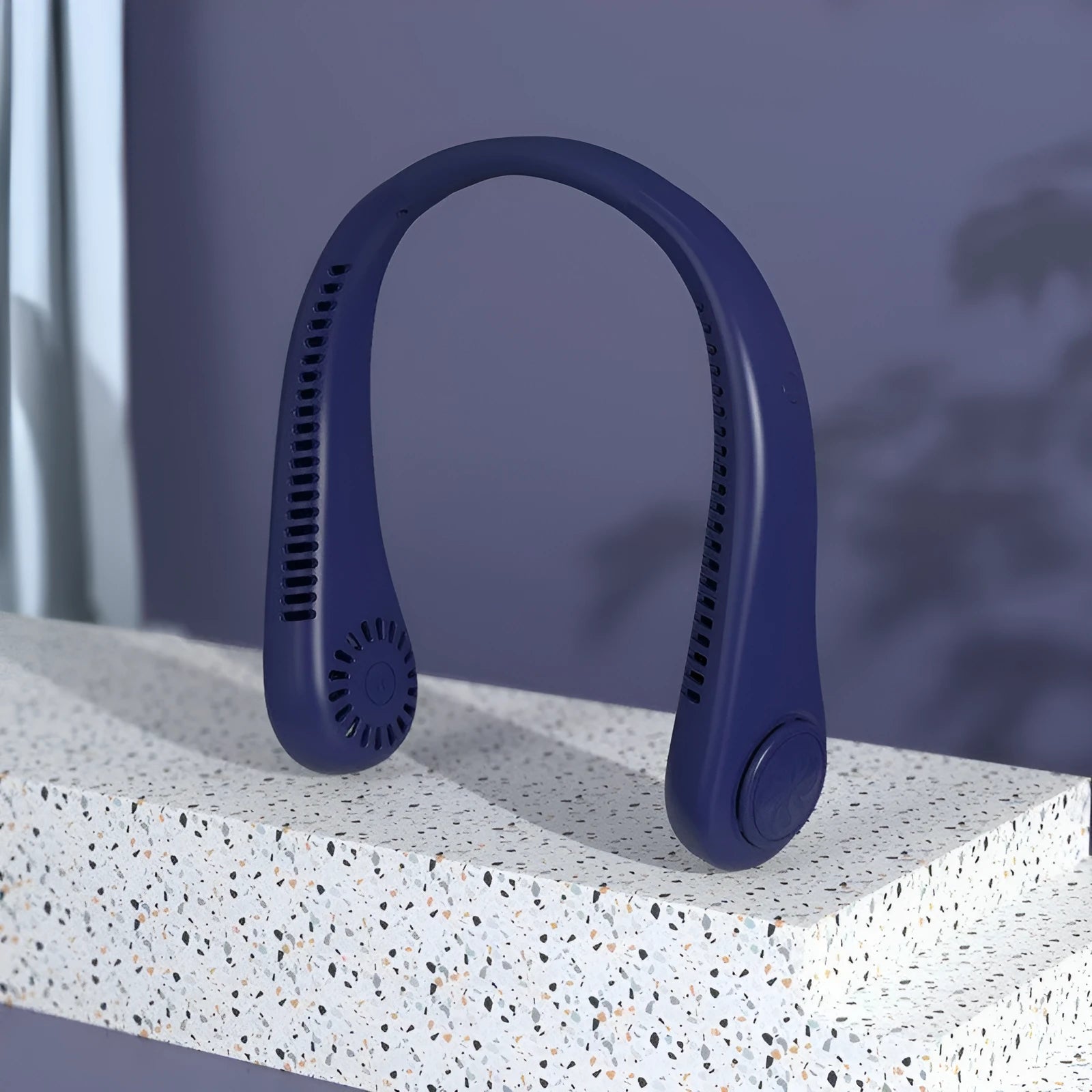 Blue portable bladeless neck fan with adjustable settings and USB charging cable