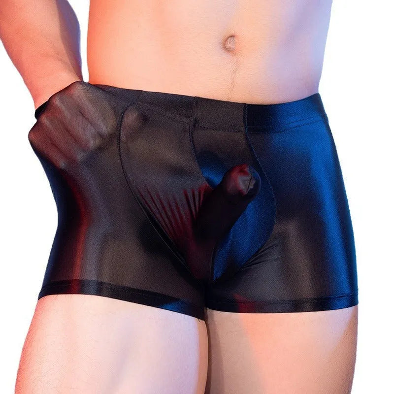 Men's seamless nylon boxer shorts in red with elephant pattern, showing mid-waist design and hip-lifting fit