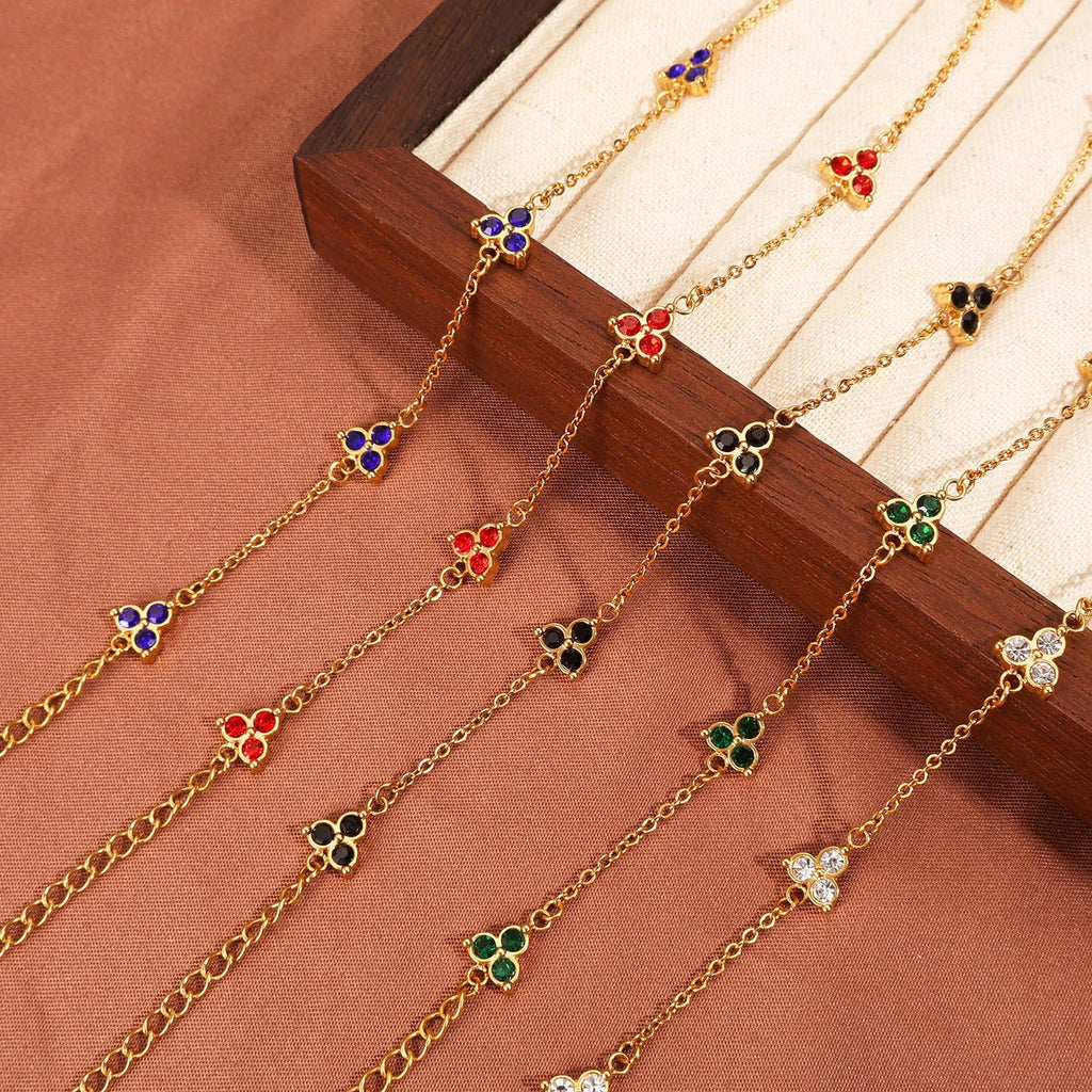Women's stainless steel geometric triangle bracelet with three diamond stones and adjustable chain